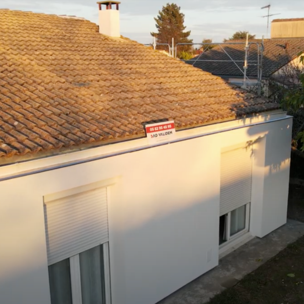 Maison rénovée avec la mention "AD VALIDEM" pour des travaux à Toulouse.